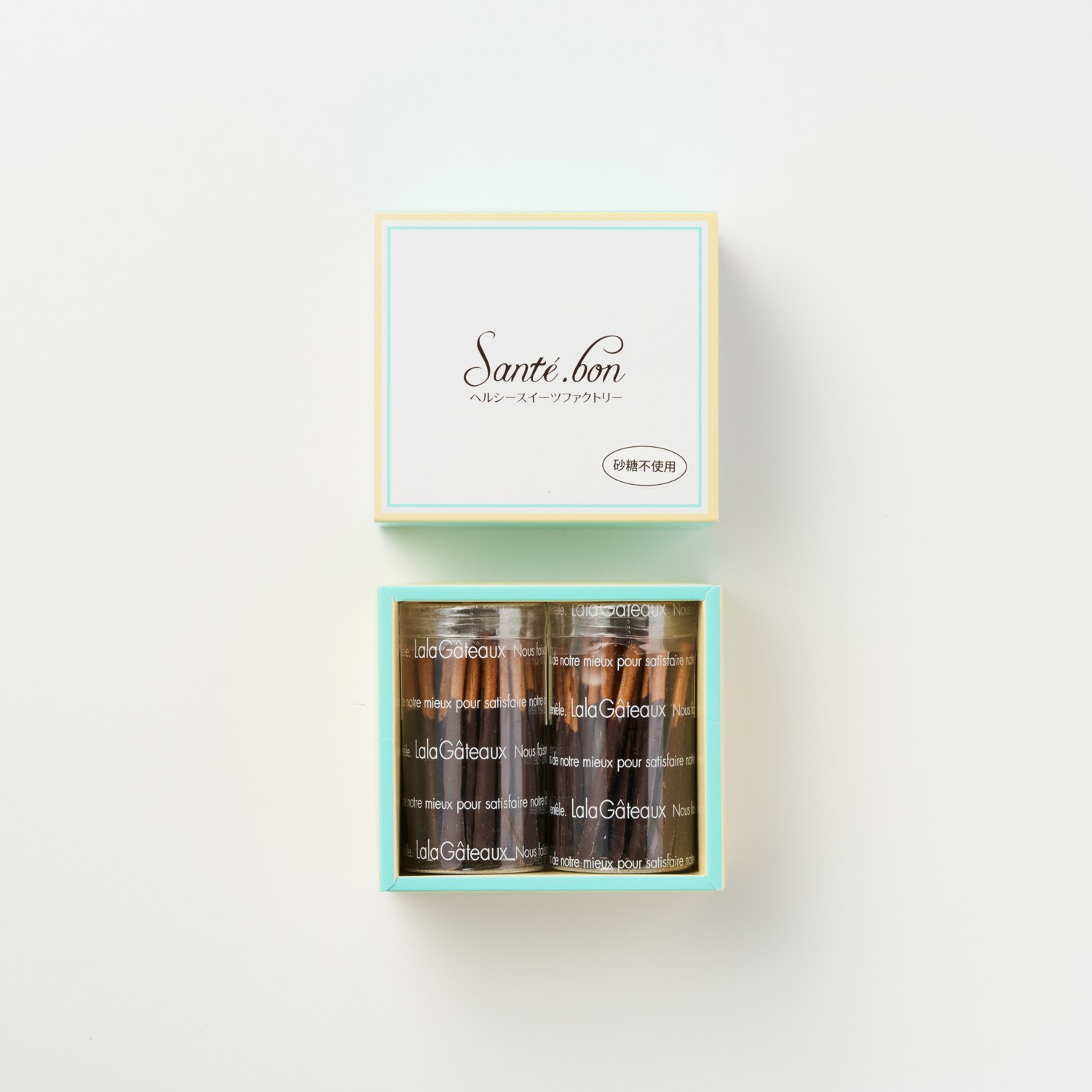 サンテボン公式商品写真:米粉のスティックチョコ2ケースとブランドの箱